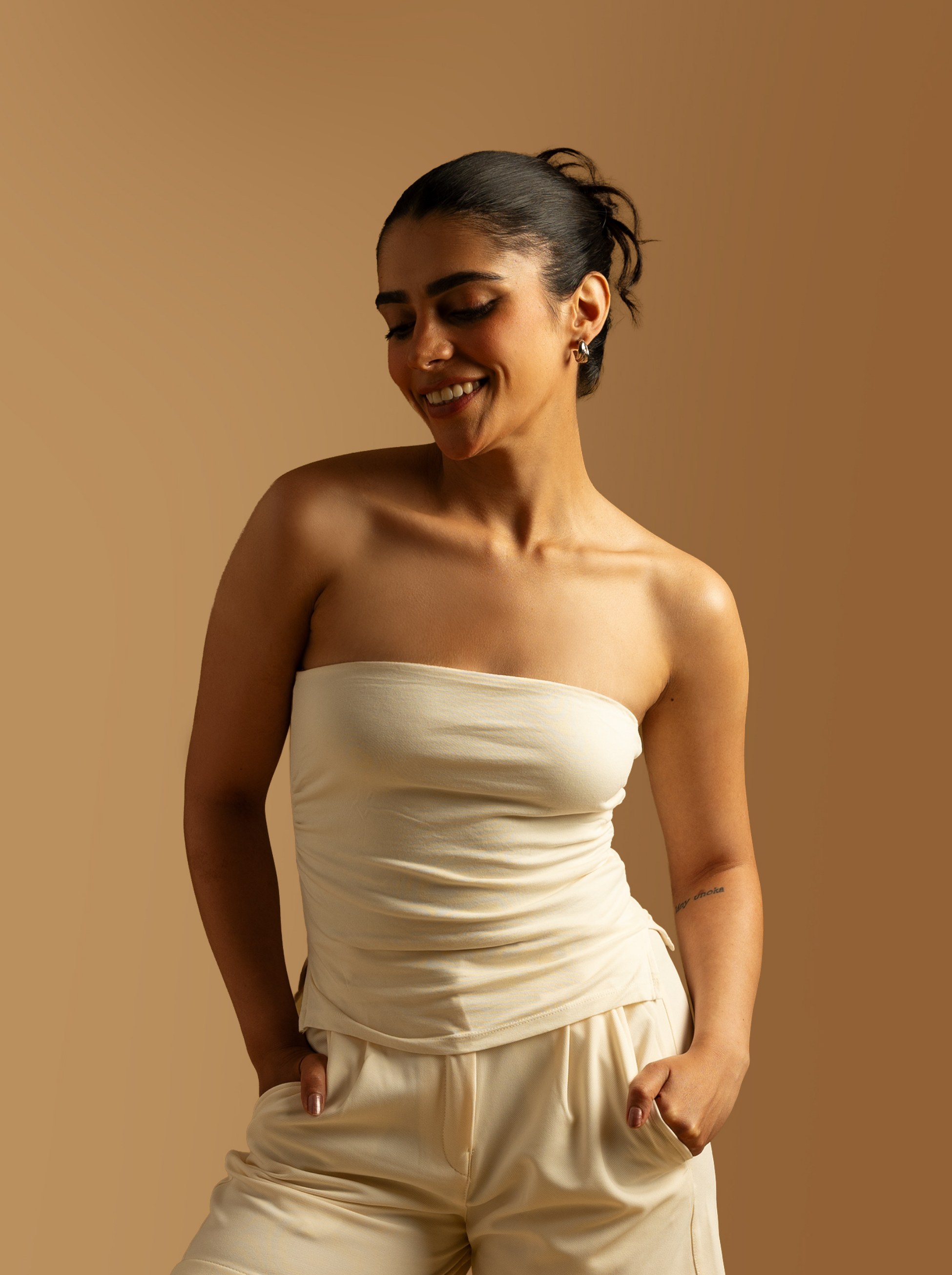 ButterBawd Glide On Tube Top in white, close-up of fitted, seamless tube top fabric