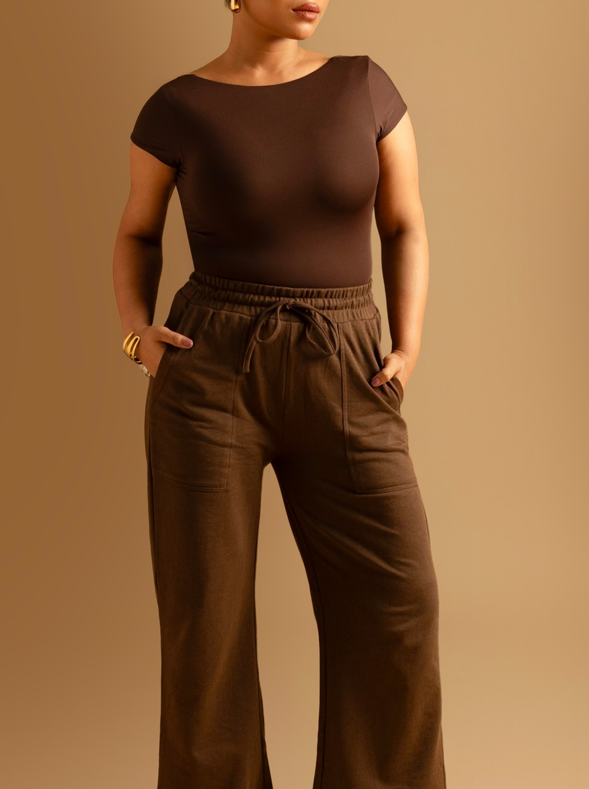 ButterBawd Boat Neck Bodysuit in brown, sleek fitted design with long sleeves