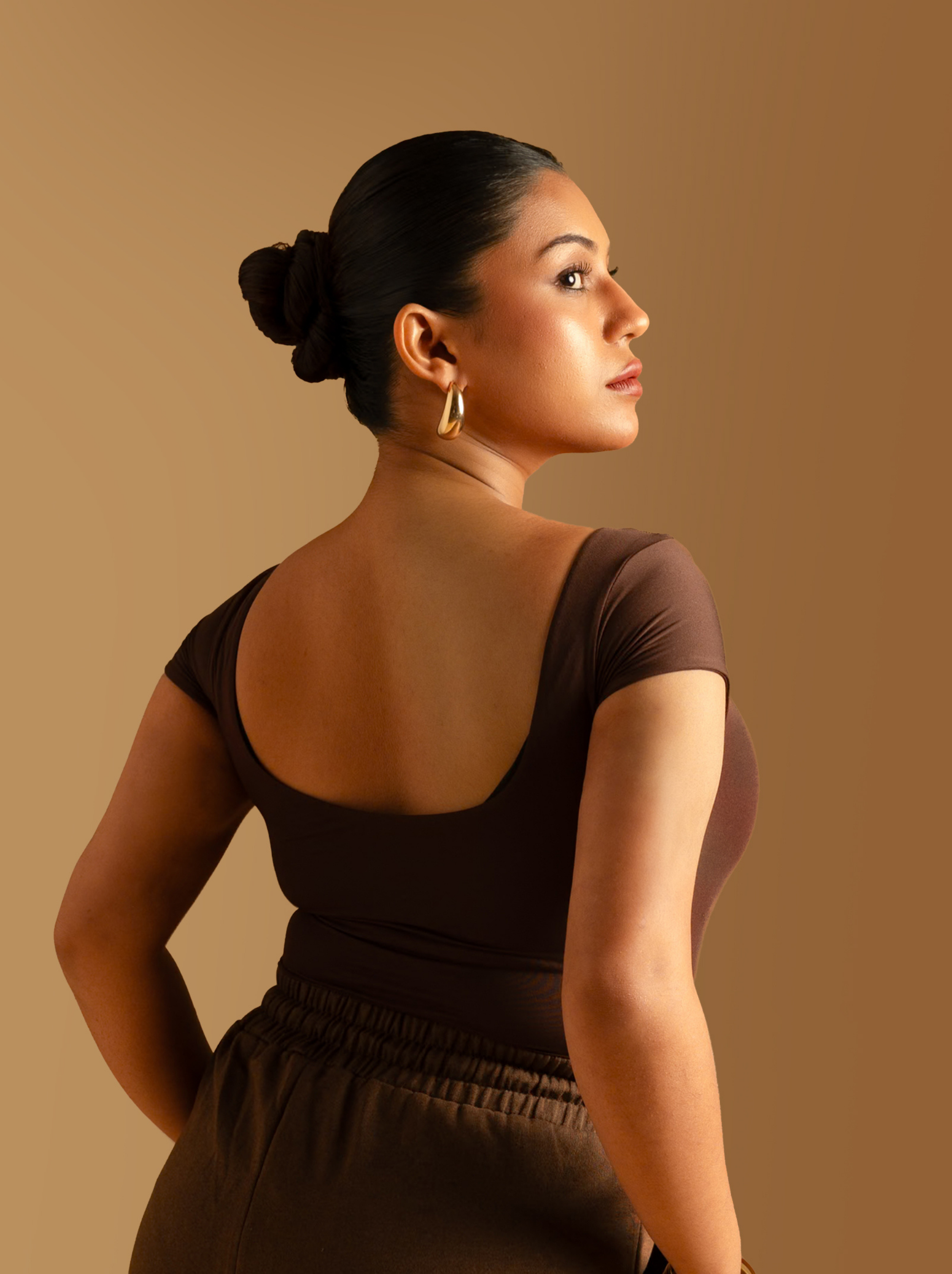 ButterBawd Boat Neck Bodysuit in brown, shown on model, stylish silhouette
