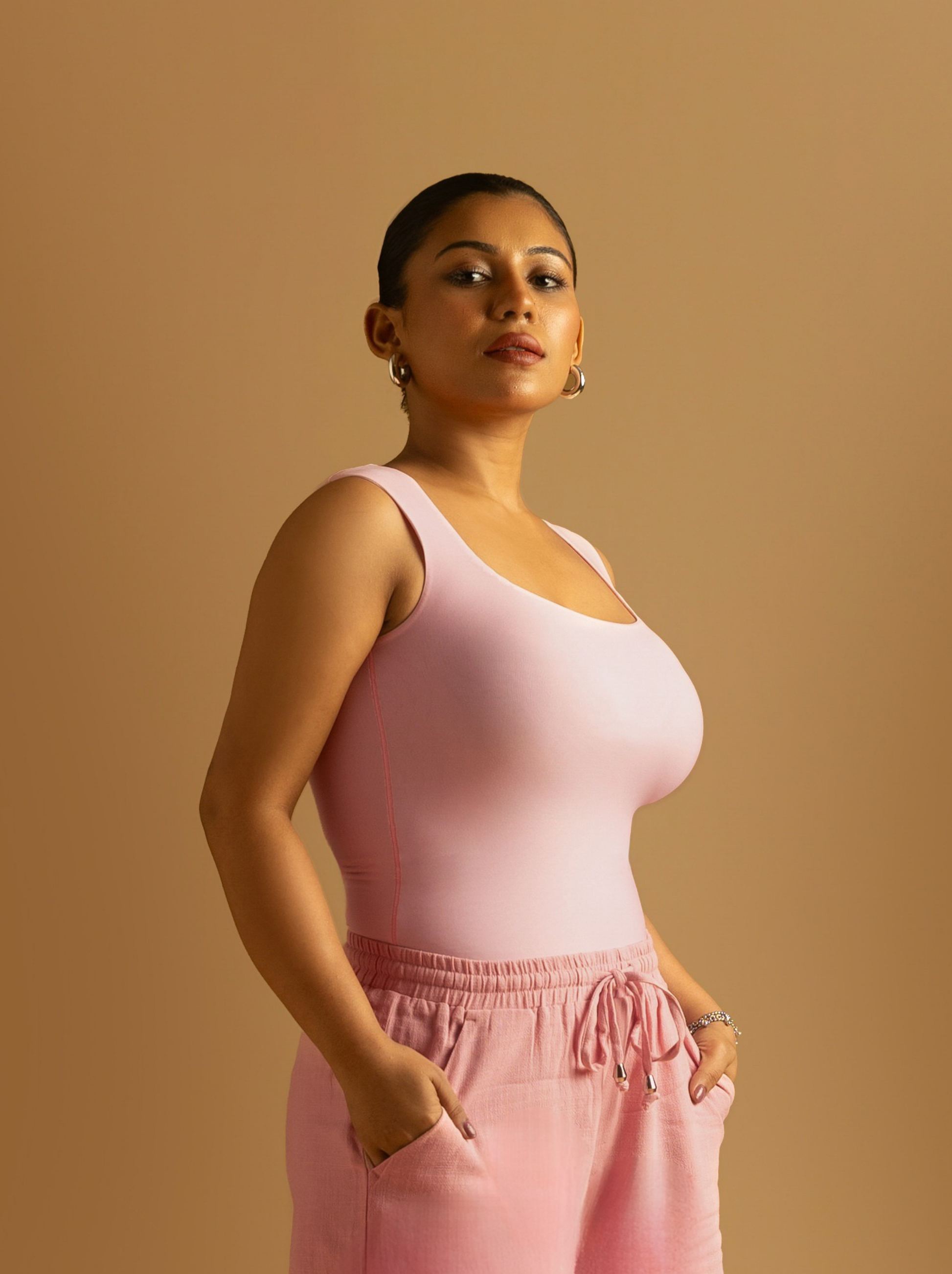 ButterBawd Square Neck Bodysuit in pink, long sleeves and fitted silhouette