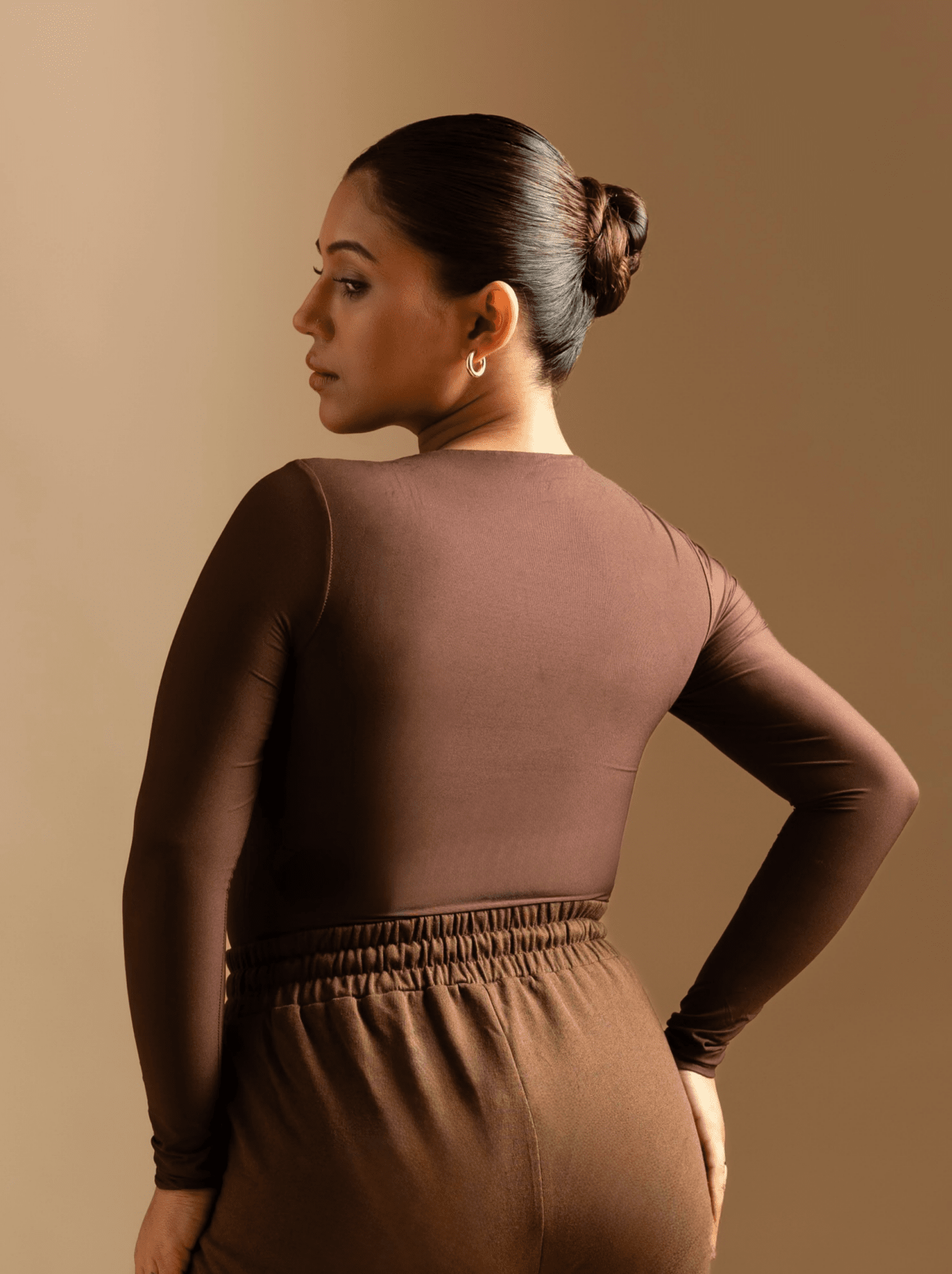 ButterBawd Butter Melt Zip Top in brown, close-up of zip-front neckline