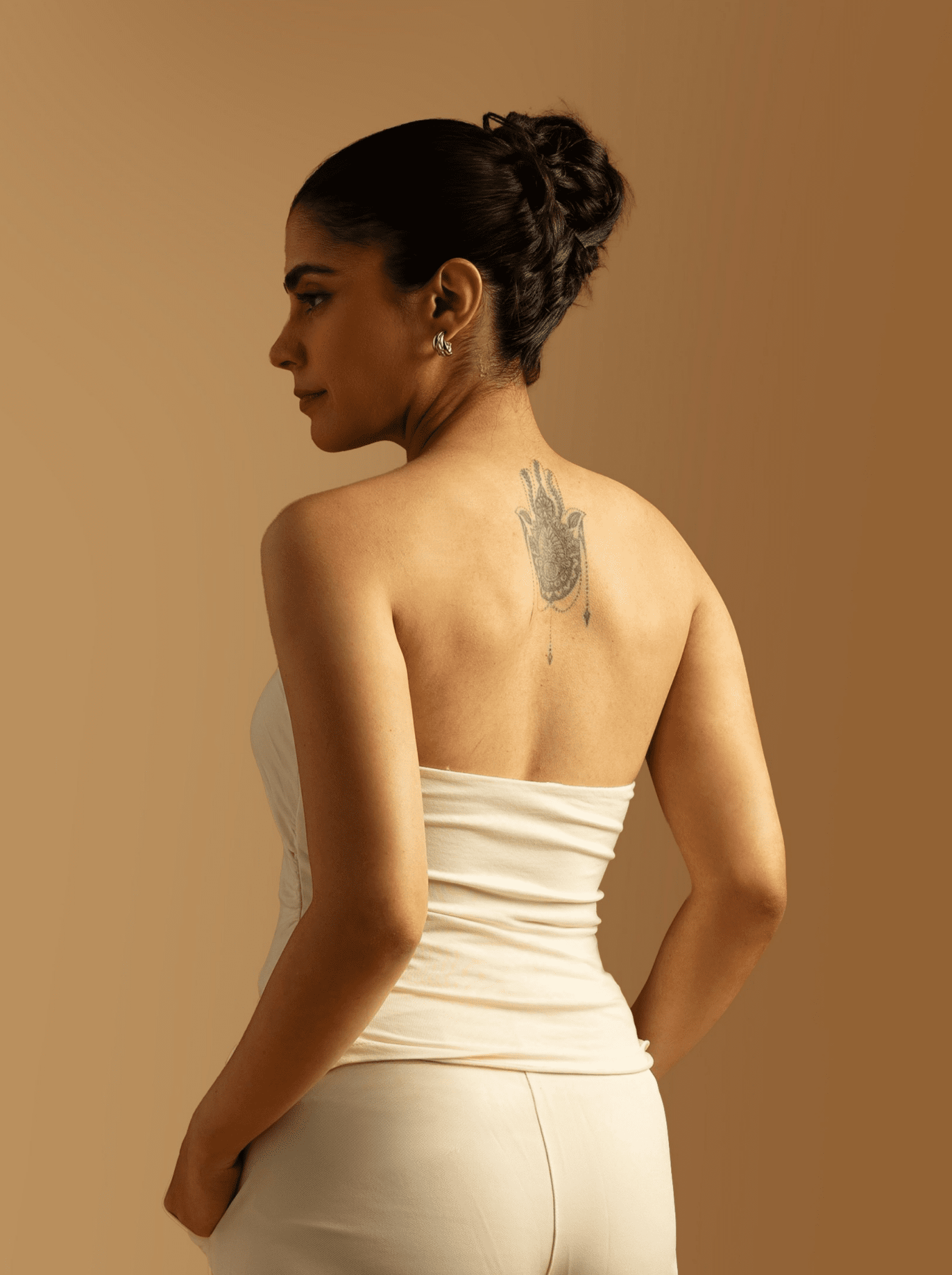 ButterBawd Glide On Tube Top in white, shown on model, seamless design