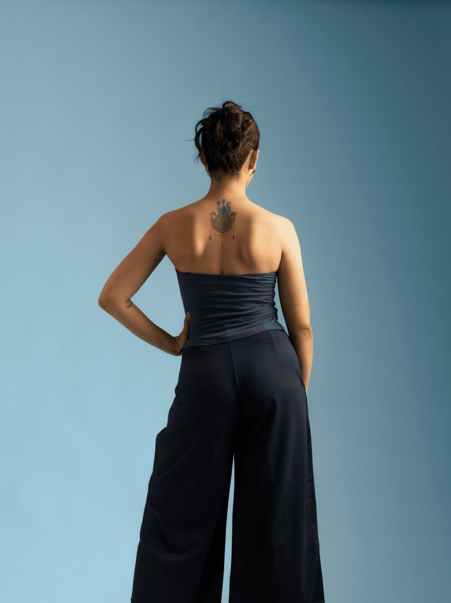 ButterBawd Glide On Tube Top in blue, shown on model, fitted design