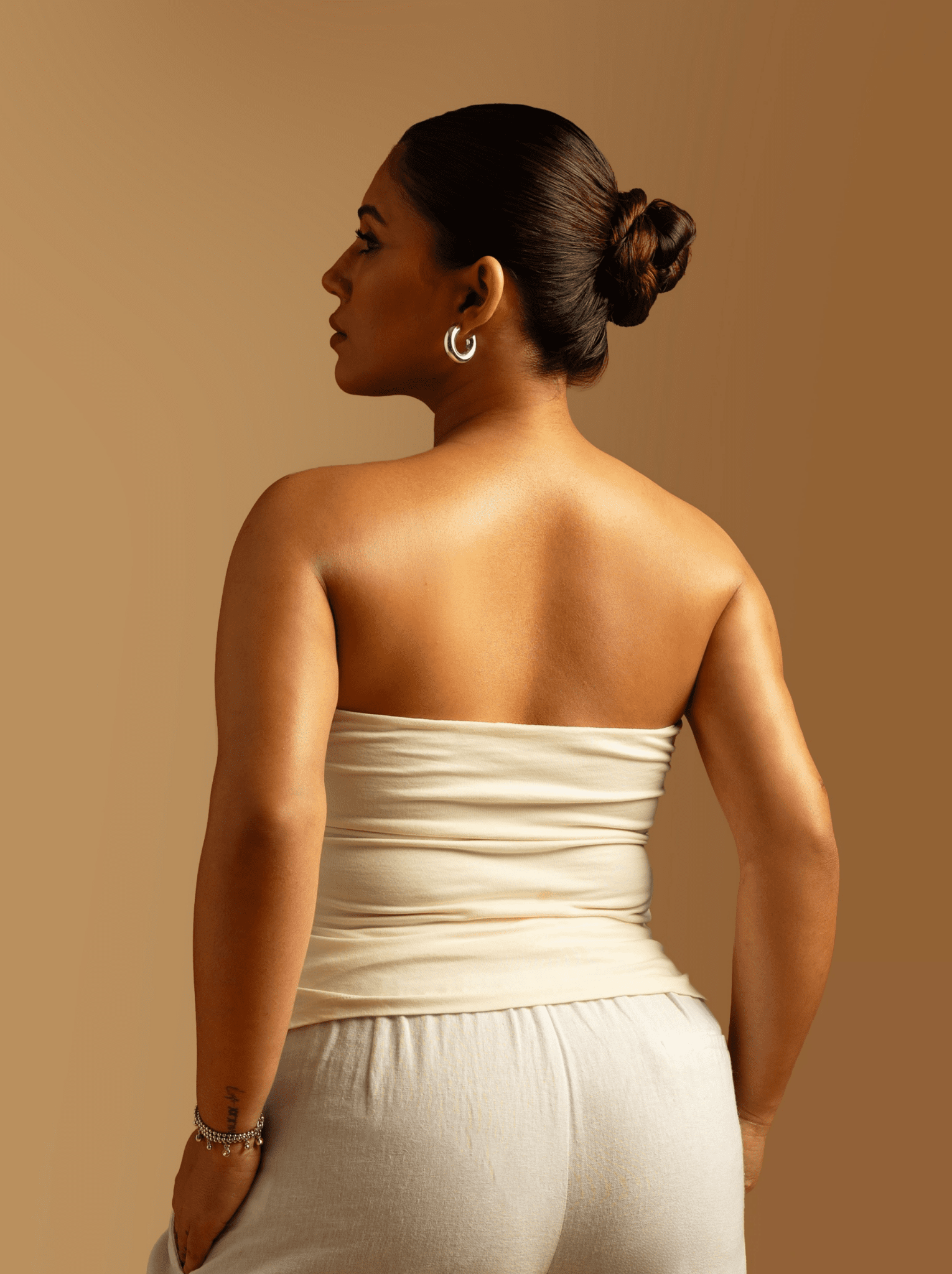 ButterBawd Glide On Tube Top in white, fitted design, smooth texture