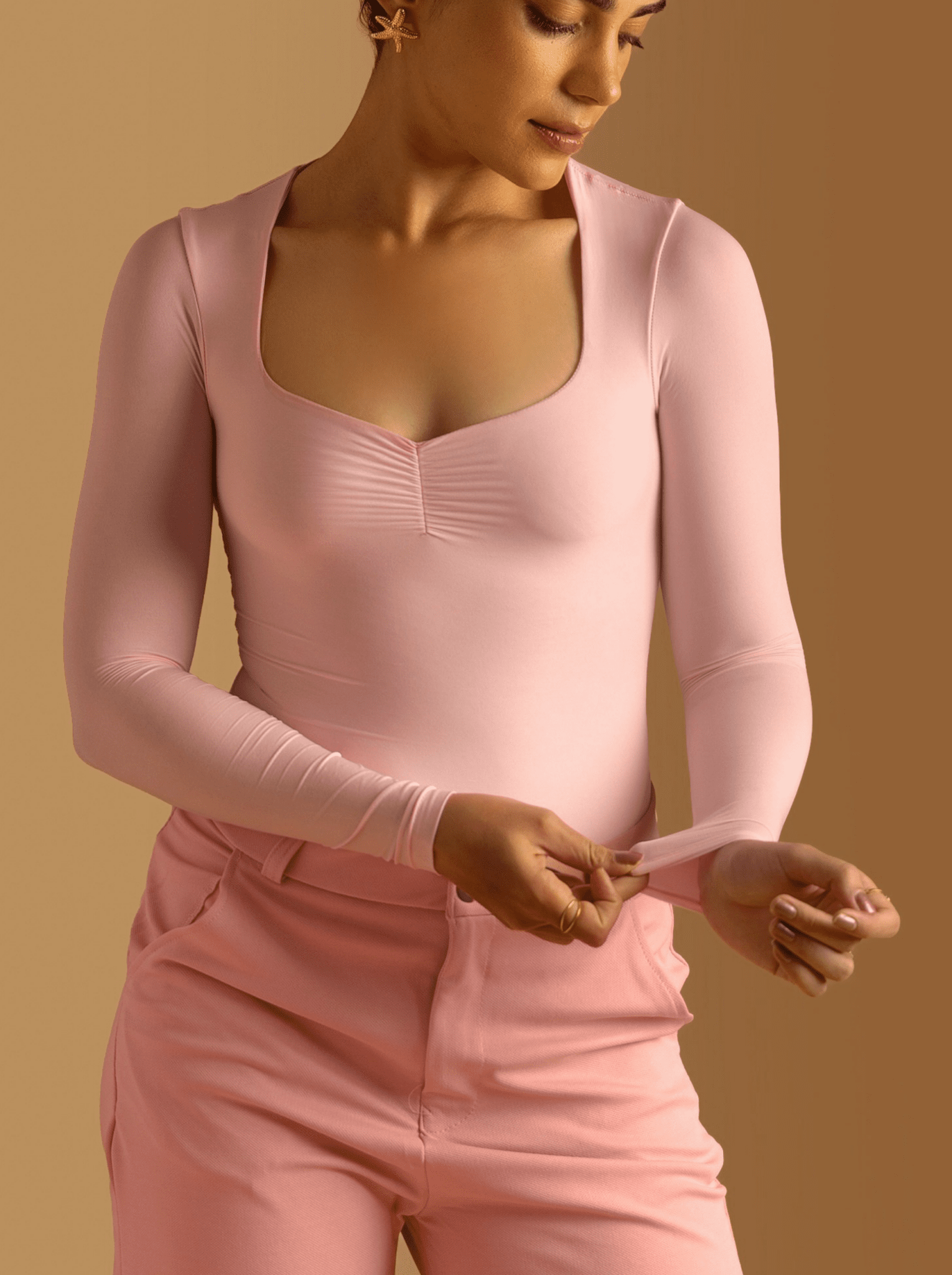 ButterBawd Heartline Melt Top in pink, close-up of fabric texture and ruffle detail