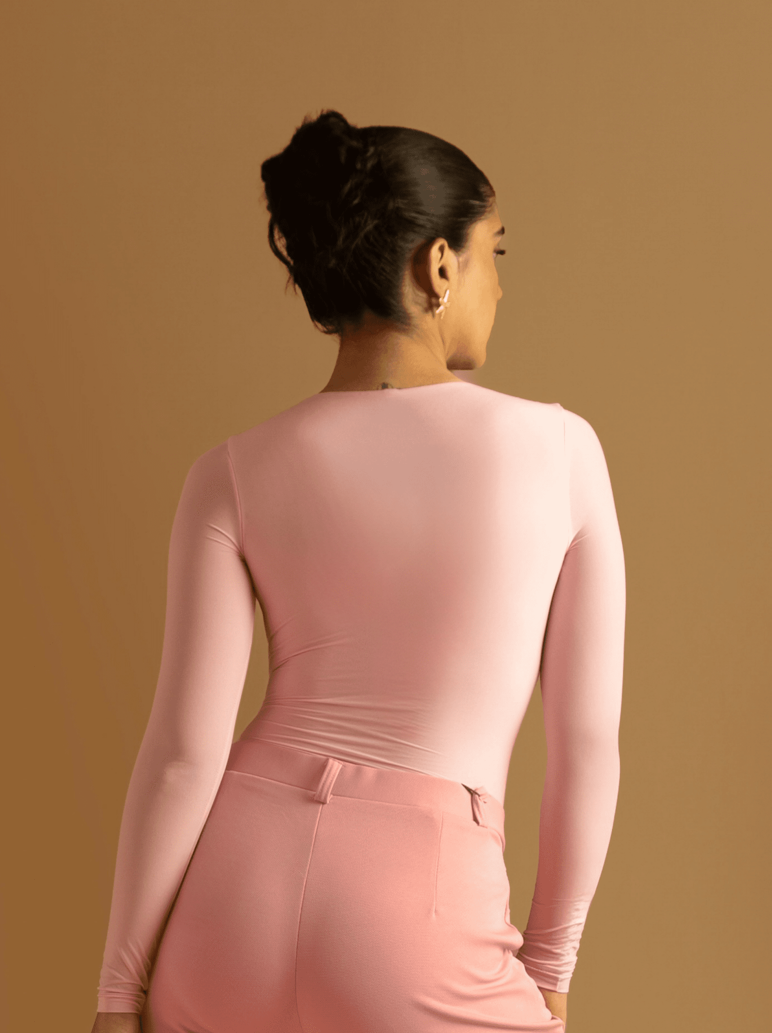 ButterBawd Heartline Melt Top in pink, close-up of ruffle detail and fabric