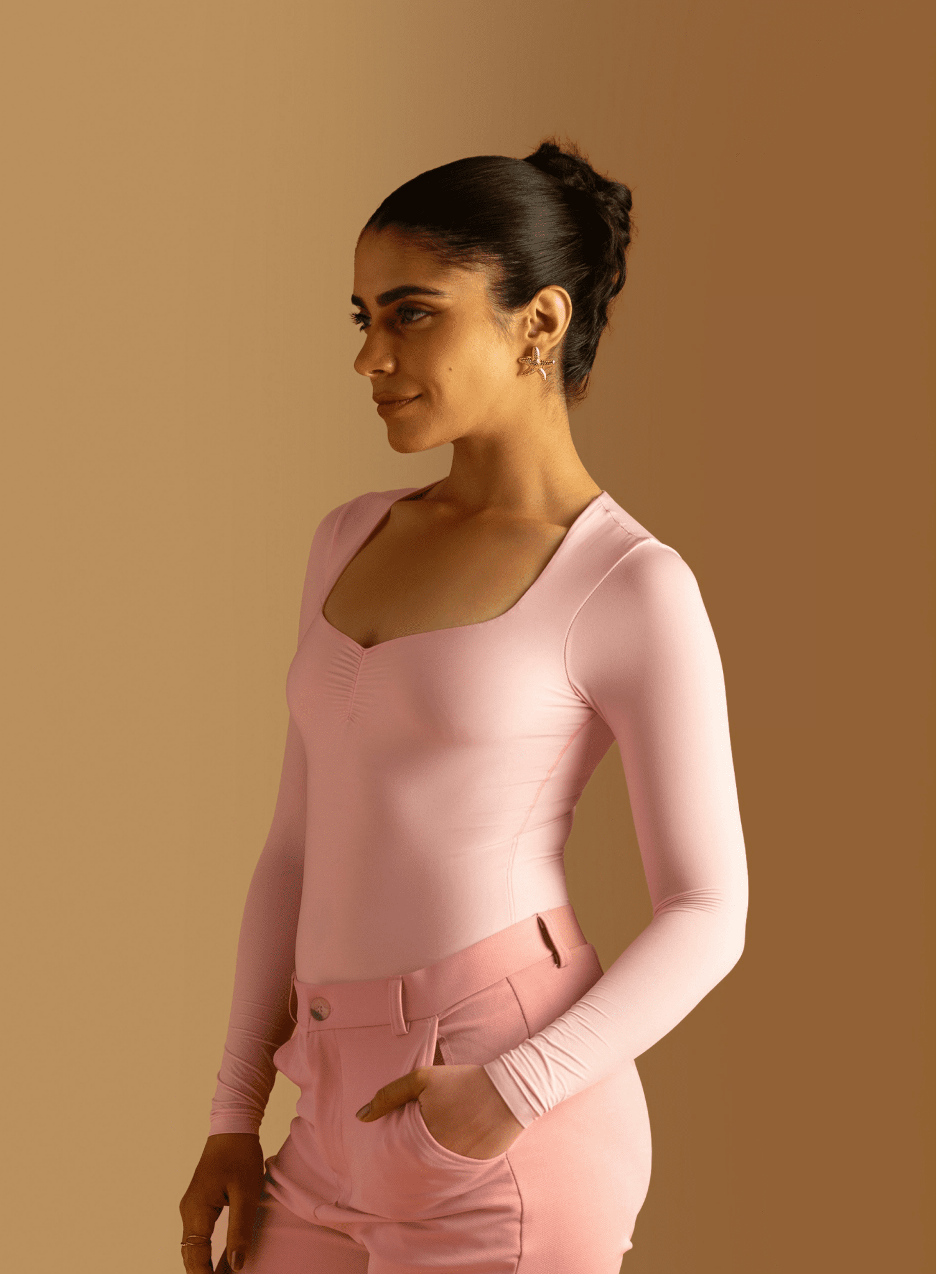 ButterBawd Heartline Melt Top in pink, shown on model, fitted style