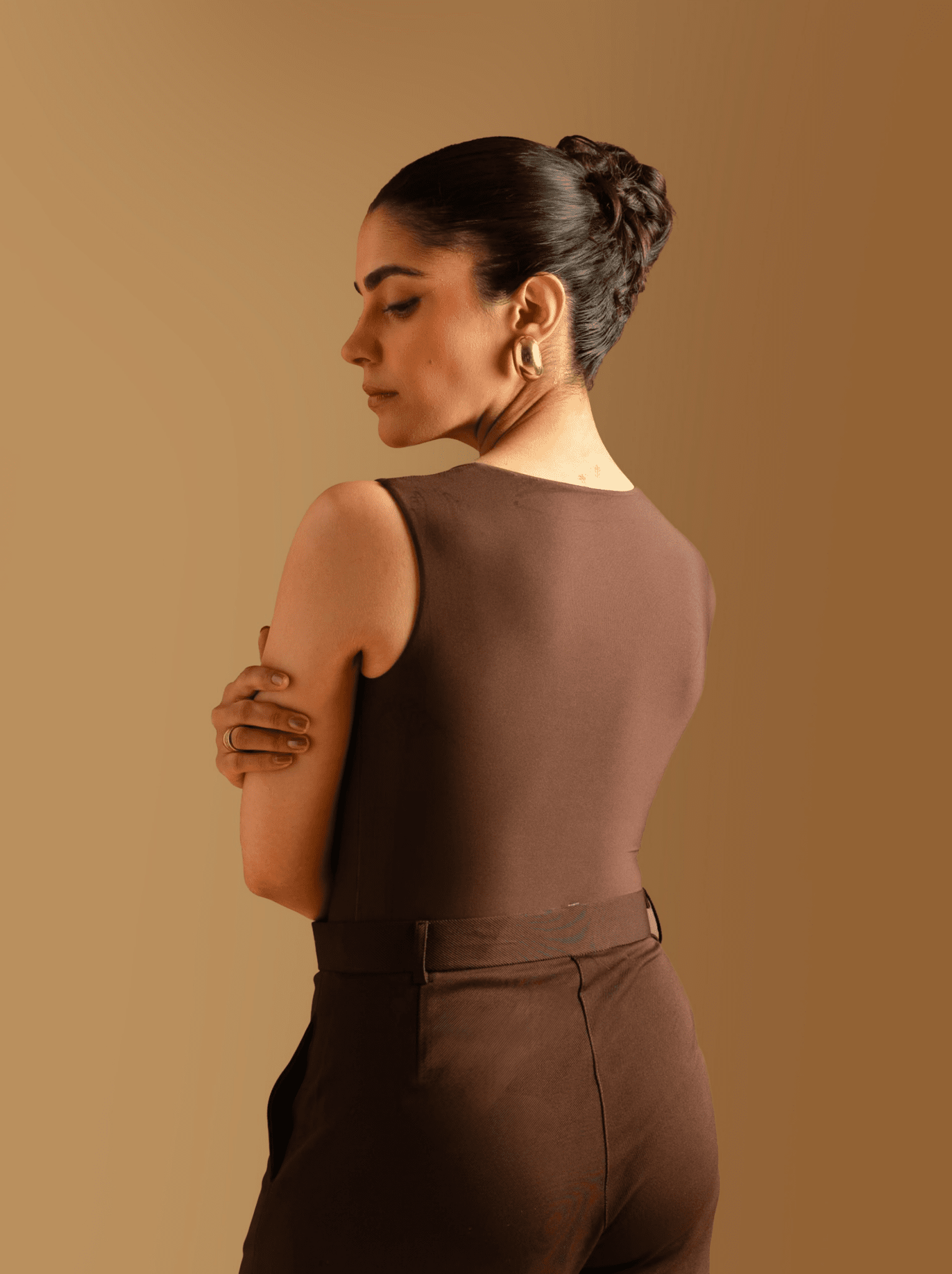 ButterBawd Square Neck Bodysuit in brown, close-up of square neckline and fabric